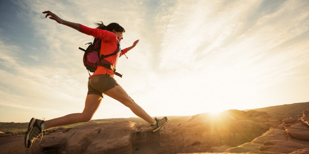 A female dayhiking in Arches Park.